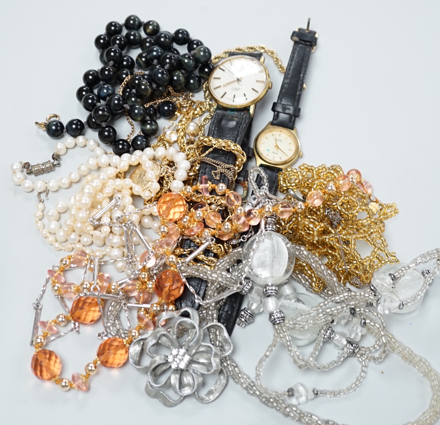 A quantity of assorted costume jewellery and wrist watches including a gentleman's steel and gold plated Rotary.